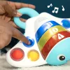 BABY EINSTEIN Érzékszervi játék rája Pop & Explore Stingray™ 6hó+
