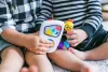 BABY EINSTEIN Zenélő játék Take Along Tunes™ 3hó+