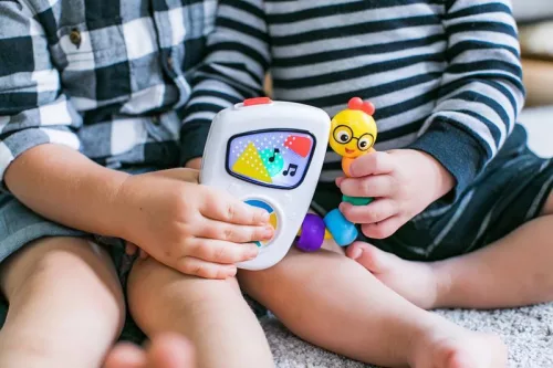BABY EINSTEIN Zenélő játék Take Along Tunes™ 3hó+