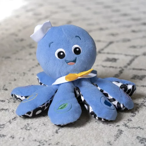 BABY EINSTEIN Zenélő játék polip Octoplush™ 3hó+