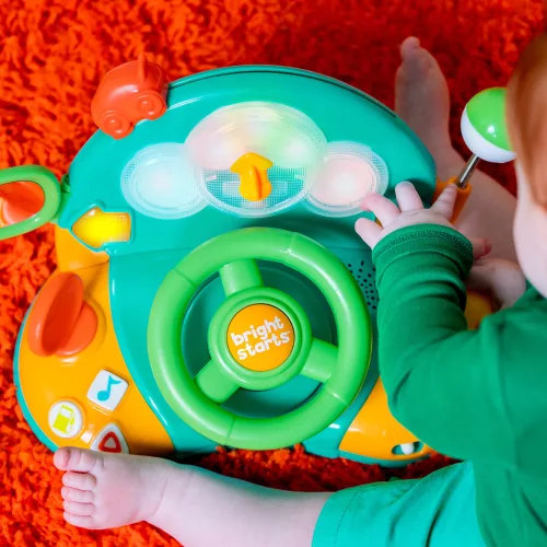 BRIGHT STARTS Zenélő kormánykerék  játék t Lights & Colors Driver™ 6hó+
