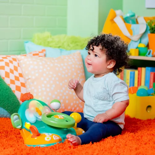 BRIGHT STARTS Zenélő kormánykerék  játék t Lights & Colors Driver™ 6hó+