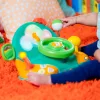 BRIGHT STARTS Zenélő kormánykerék  játék t Lights & Colors Driver™ 6hó+